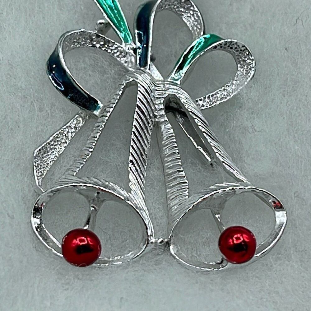 Vintage Gerry’s  silver bell Christmas brooch .